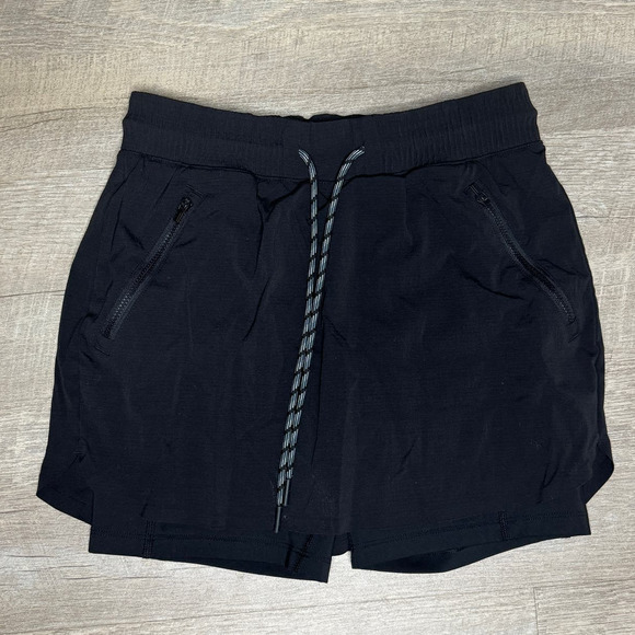 ATHLETA Solid Black Trekkie Athletic Skort Jupe Short UPF Hiking Gorpcore Size 0 - Picture 1 of 8